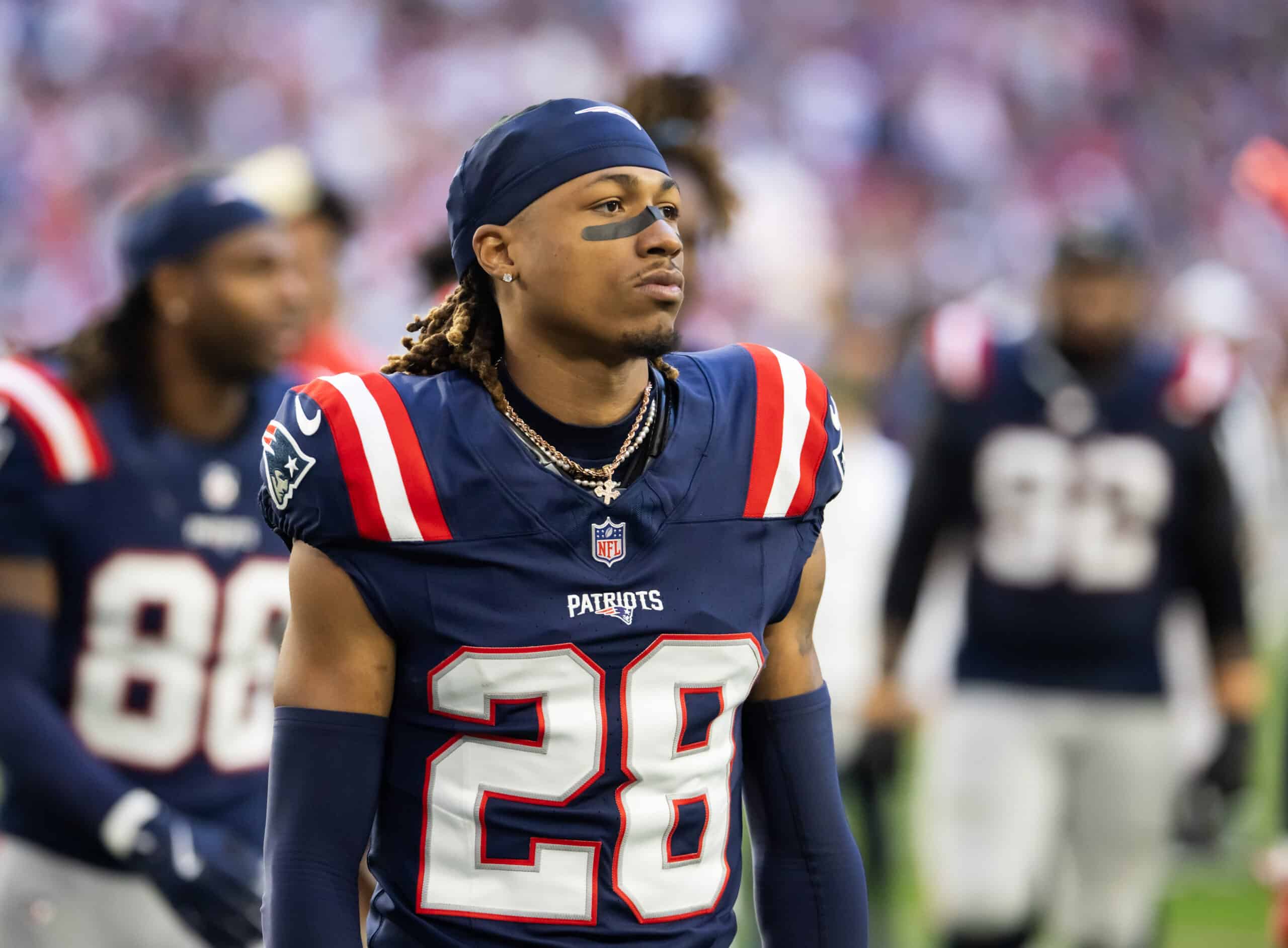 Dec 15, 2024; Glendale, Arizona, USA; New England Patriots cornerback Alex Austin (28) against the Arizona Cardinals at State Farm Stadium. Mandatory Credit: Mark J. Rebilas-Imagn Images